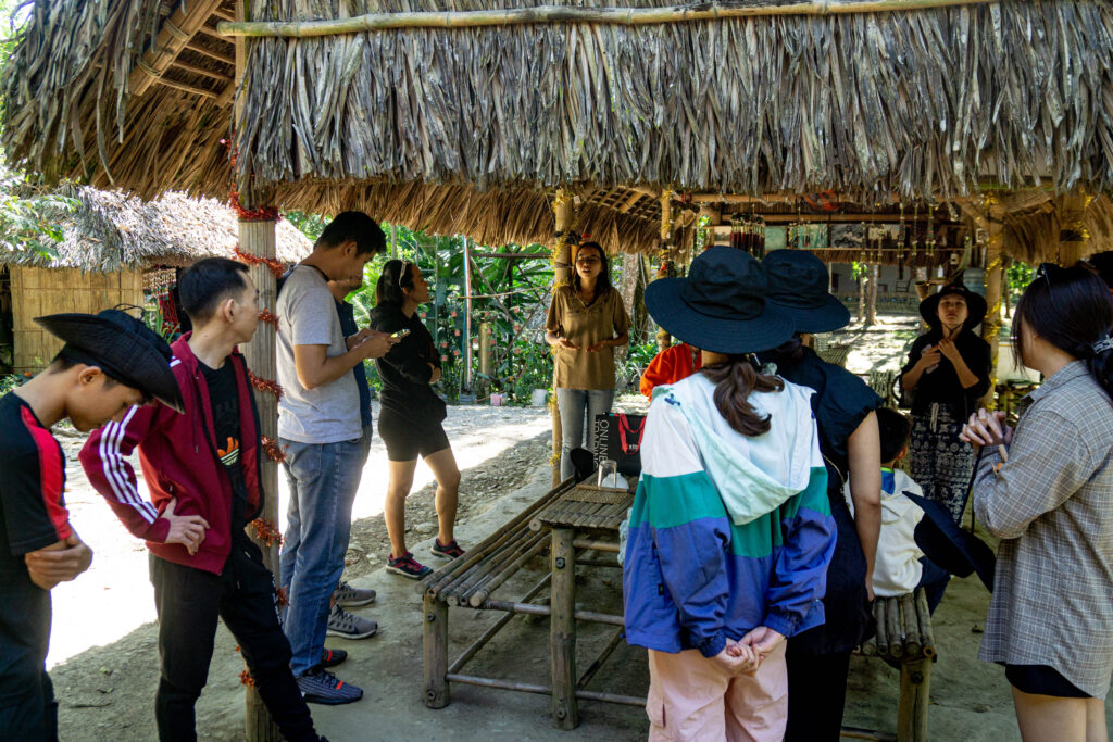 visit Ta Lai longhouse Nam cat tien team building