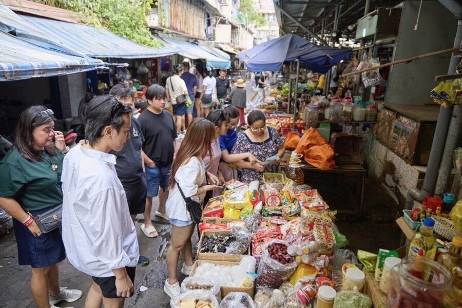 Exploring a vibrant market during a Vietnamese cooking class