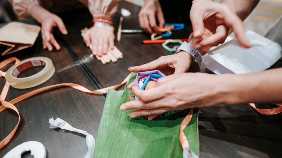 Corporate team participating in problem-solving activities to improve teamwork and collaboration in Vietnam