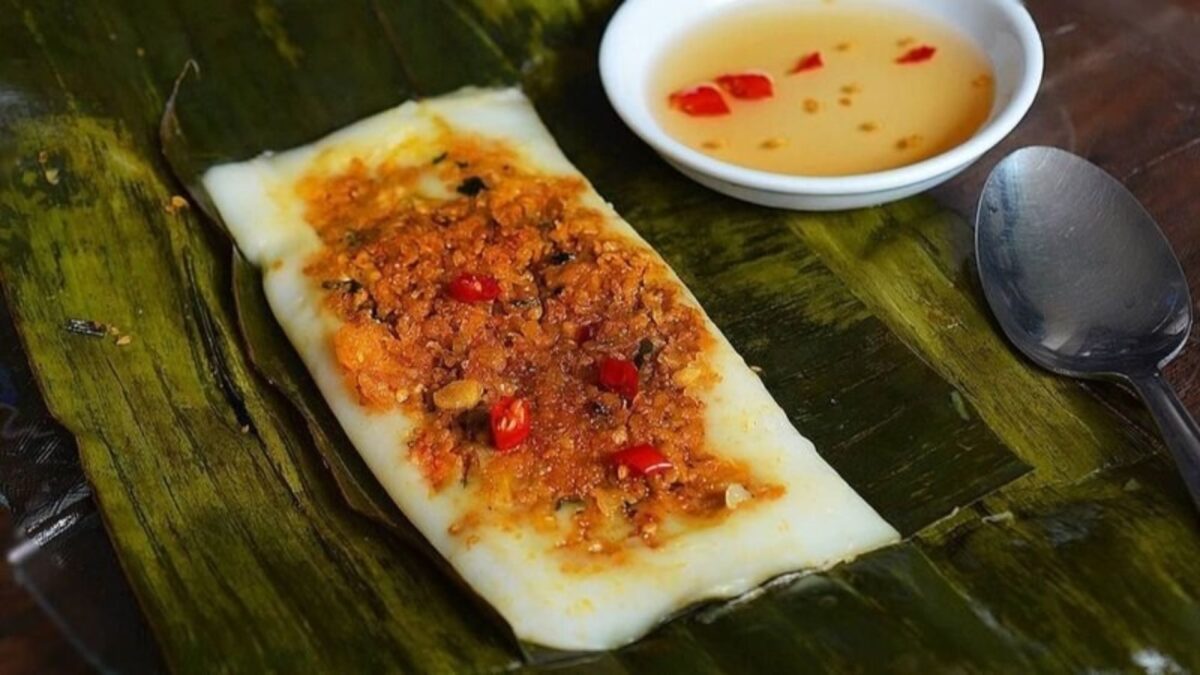bánh nậm close-up with shrimp topping, banana leaf, and fish sauce - hue food - Jackfruit