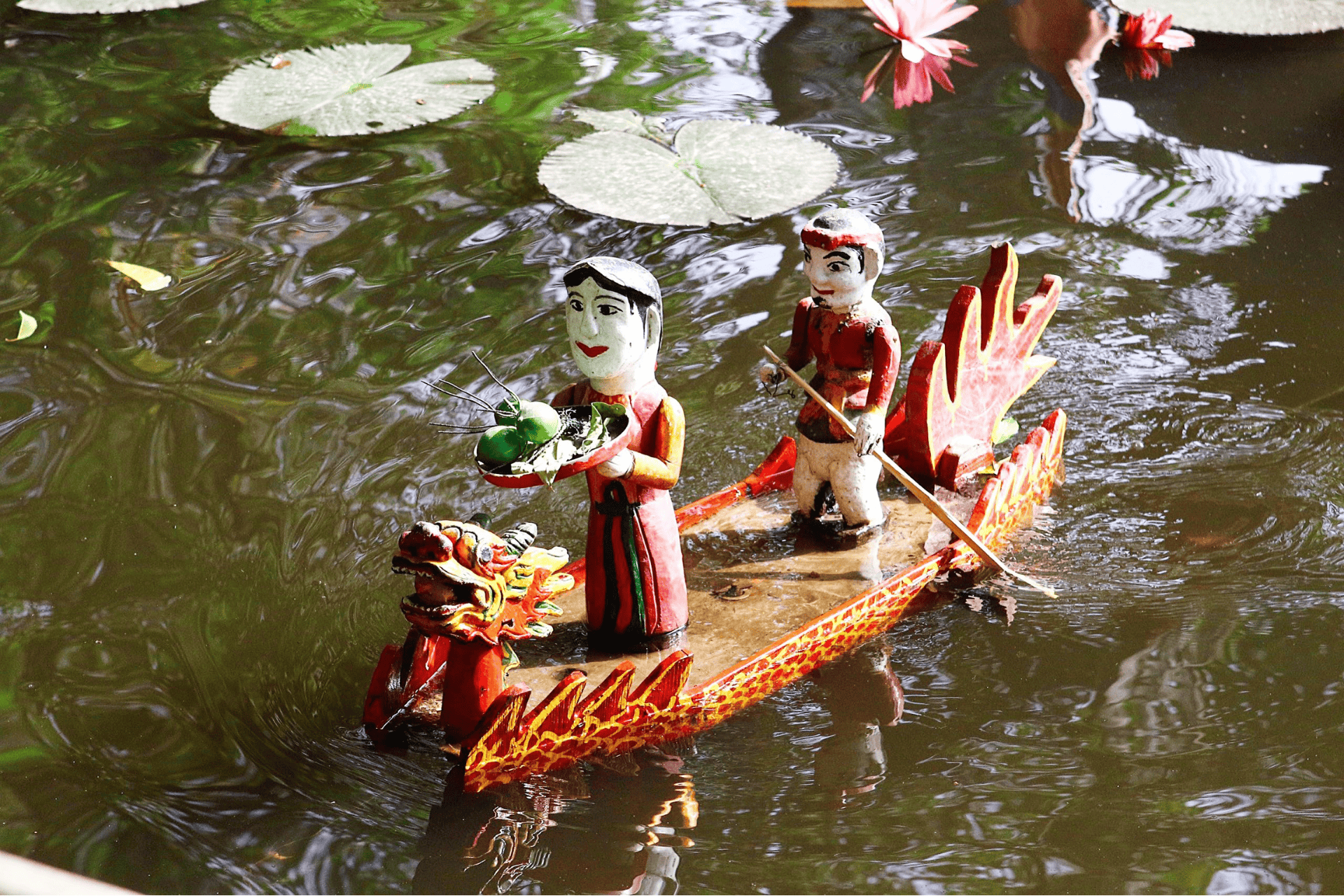 hanoi water puppet show performance with puppets on water stage_Jackfruit Adventure